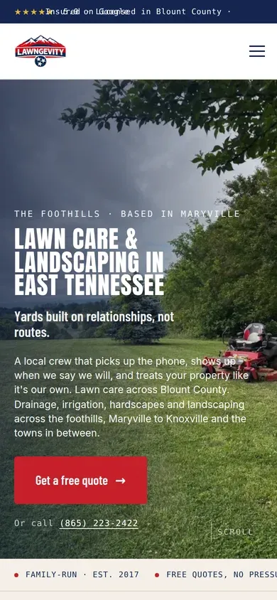 The Lawngevity homepage on a phone, with the logo, menu and a full-width quote button